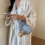 Women’s mini handbag with detachable plush pendant