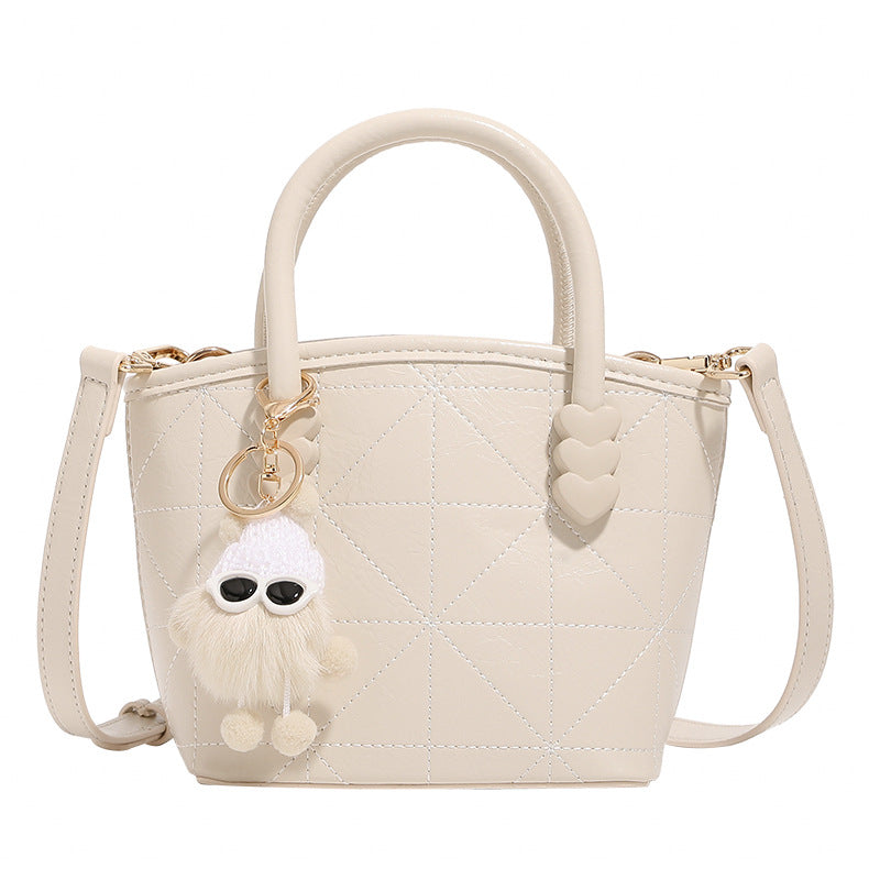 Mini Handbag with Playful Chain Charm
