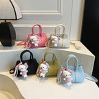 Ladies Mini Handbag with Playful Plush Pendant