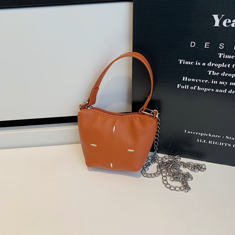 mini handbag with shiny chain and textured upper material