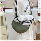 Shoulder bag with adjustable shoulder strap and practical compartments