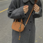 mini handbag with detachable shoulder strap and elegant design
