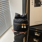 quilted mini handbag with stylish pearl accents