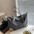 Large travel bag with durable material and multiple compartments