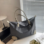 Large travel bag with durable material and multiple compartments