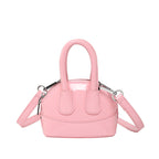 mini handbag with elegant glossy finish and removable shoulder strap