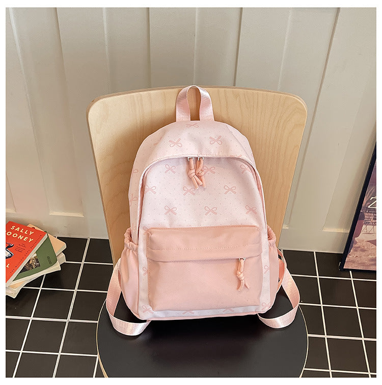 Cute everyday backpack with embroidered bows