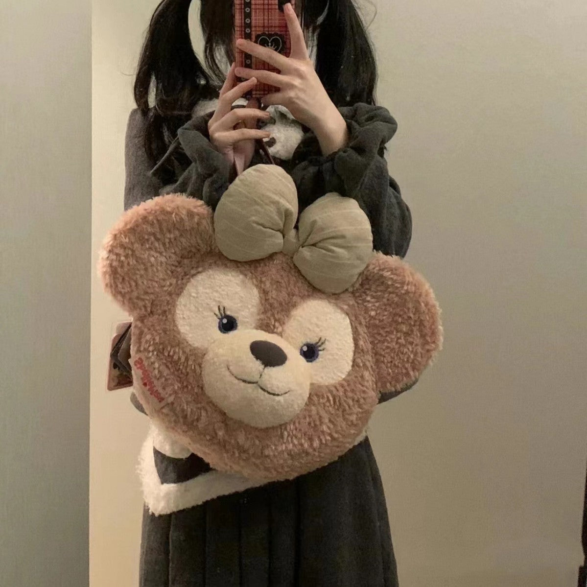 Plush handbag with bear head design