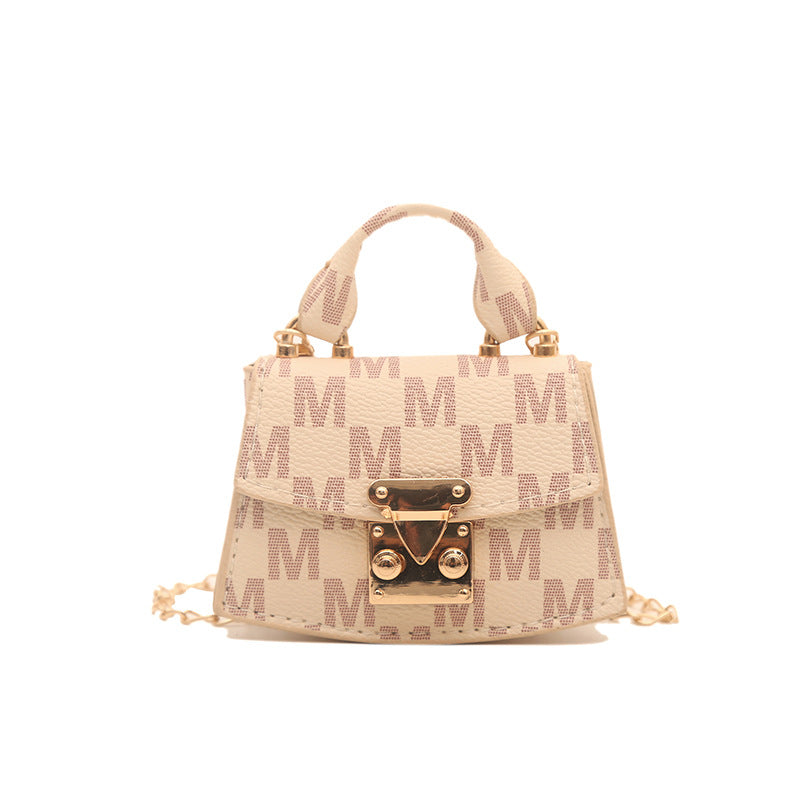 Women’s mini handbag with decorative chain strap