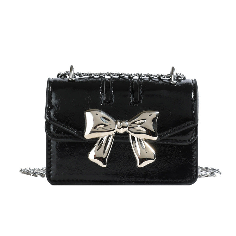 Mini Handbag with Shimmering Bow Closure