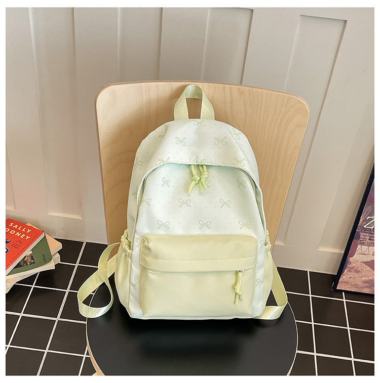 Cute everyday backpack with embroidered bows