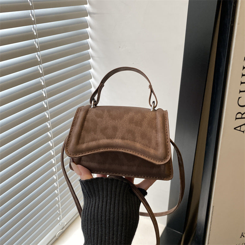 retro-style mini handbag with removable shoulder strap