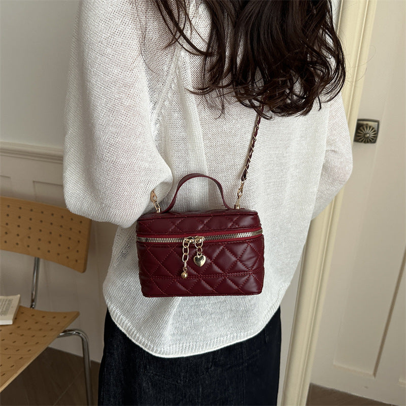elegant quilted mini handbag with detachable shoulder strap