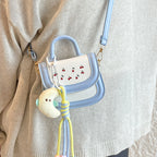 mini handbag with cheerful cherry design and charming charms