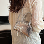mini handbag with stylish crocodile look and detachable pendant