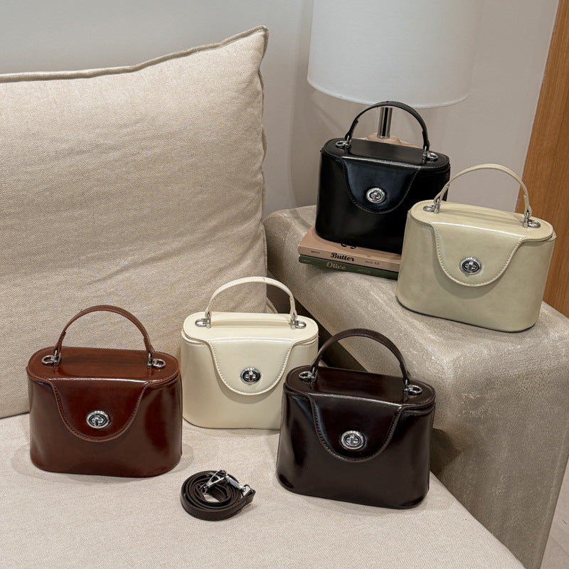 Ladies elegant mini handbag with stylish pendant