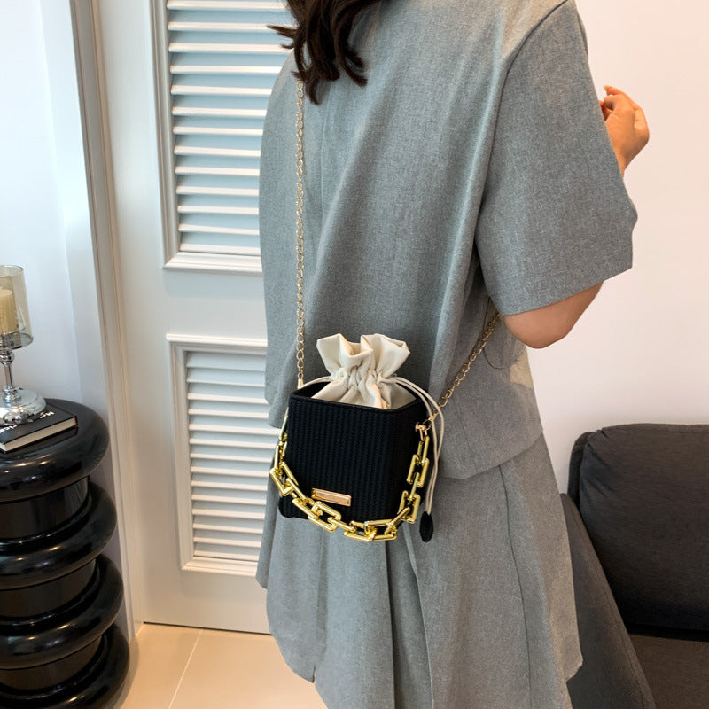 mini handbag with unique chain decoration and classic drawstring Nord bags