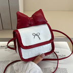Women’s mini handbag with playful bow detail