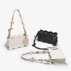 mini handbag with creative wave pattern and playful pendant