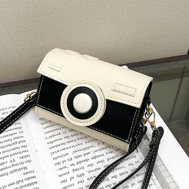 Women Mini-Handbag with Playful Flap Closure