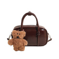 mini handbag with charming bear pendant