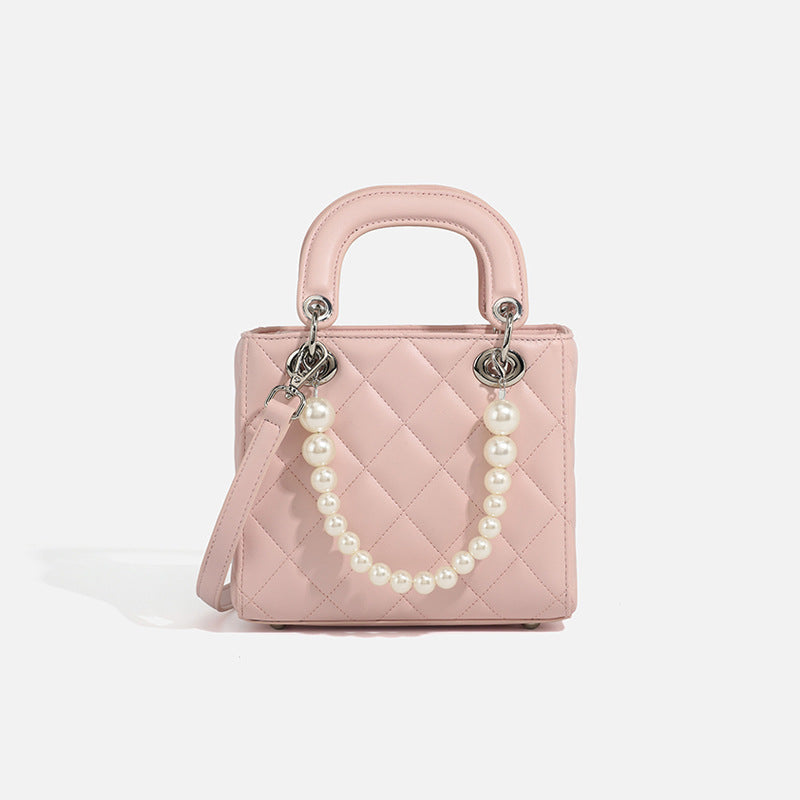 Women’s mini handbag with pearl-embellished chain and quilted design