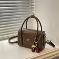 Ladies Mini-Handbag with Elegant Structure and Charming Pendant