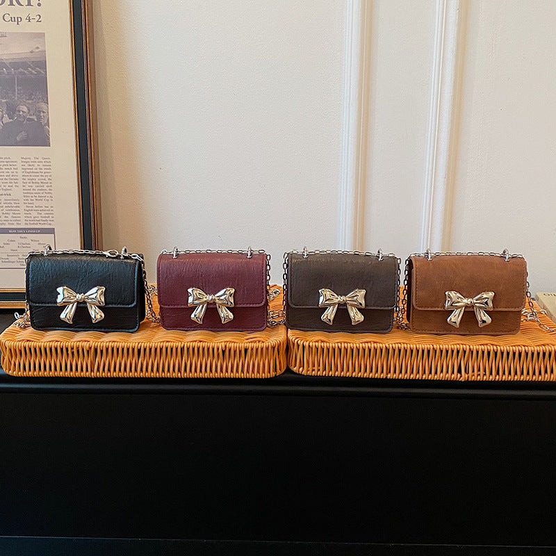 Charming Bow-Embellished Mini Handbag
