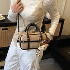 Women’s mini handbag with removable teddy pendant