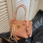Mini handbag with elegant details and practical shoulder strap