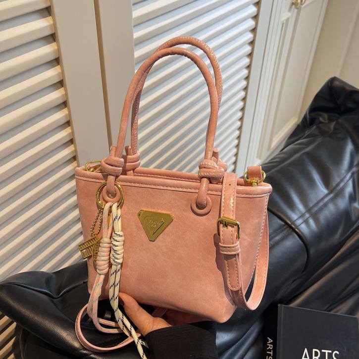 Mini handbag with elegant details and practical shoulder strap