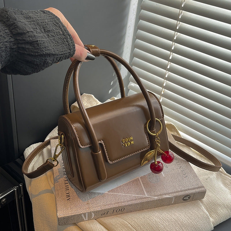 Ladies Mini-Handbag with Elegant Structure and Charming Pendant