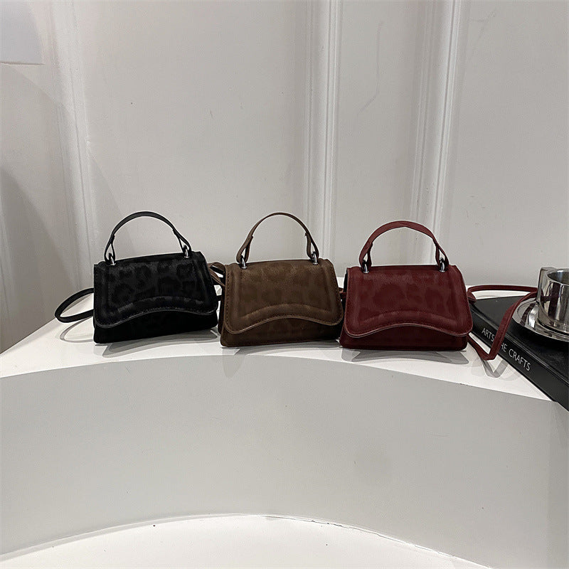 retro-style mini handbag with removable shoulder strap