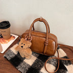 mini handbag with charming bear pendant
