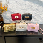 mini handbag with quilted design and golden closure