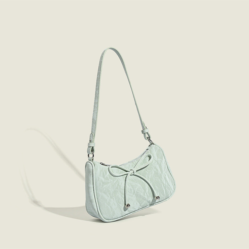 elegant mini handbag with playful drawstring Nord Bags