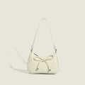 elegant mini handbag with playful drawstring Nord Bags
