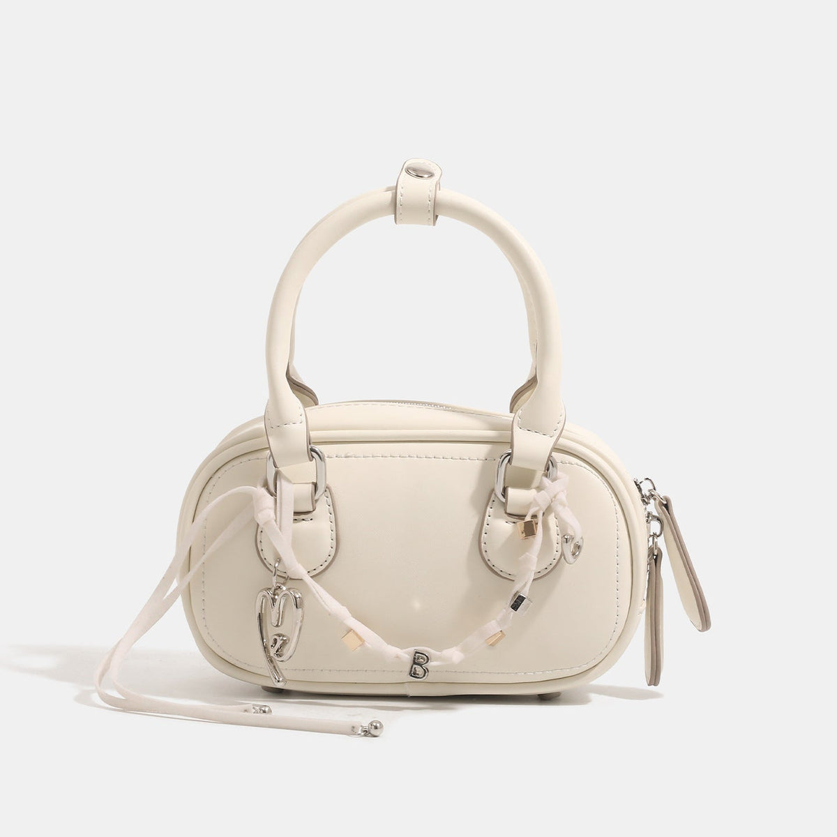 Ladies mini handbag with playful drawstring and elegant accents