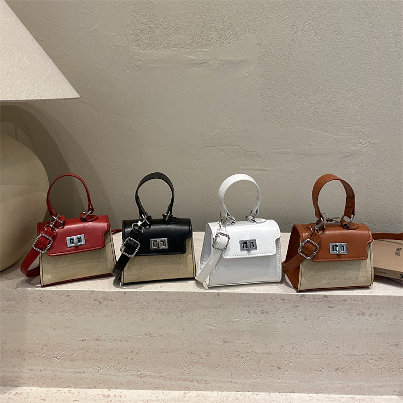Women’s Mini-Handbag with luxurious leather look and practical carrying handles