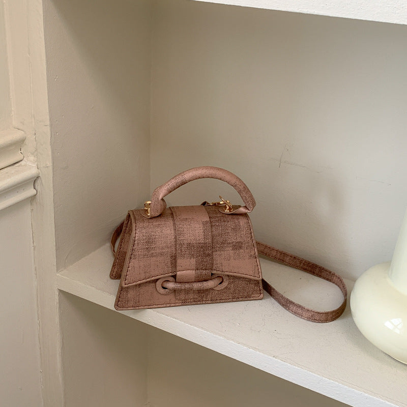 Ladies elegant mini handbag with textured design