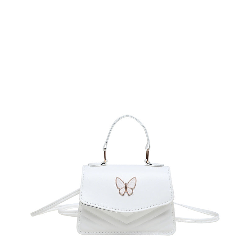 Chic Mini Handbag with Elegant Butterfly Accent