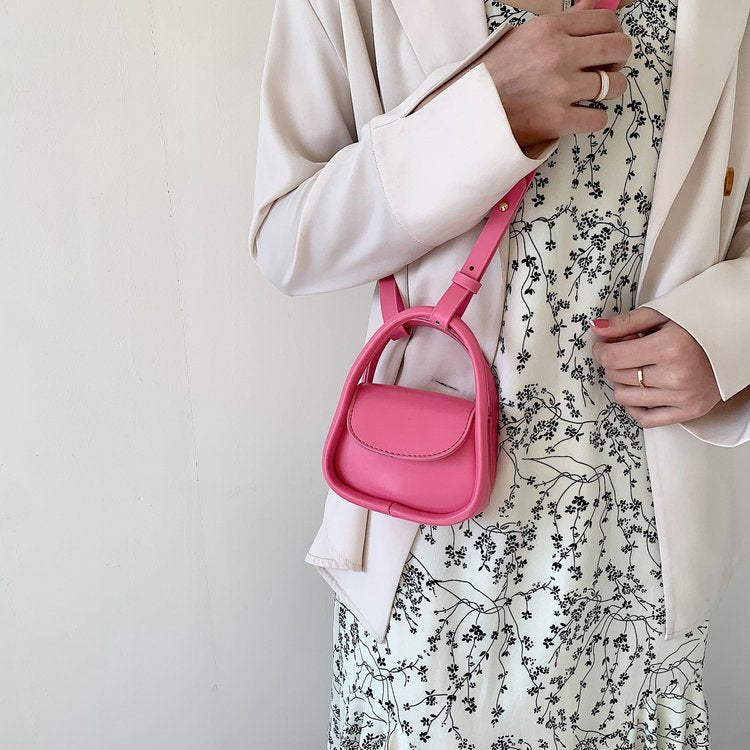 Ladies mini handbag with elegant chain accent