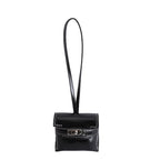 mini handbag made of high-quality synthetic leather with playful closure