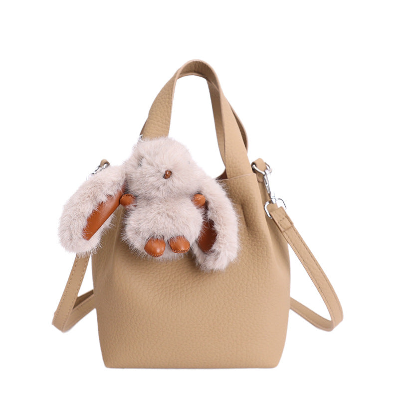 Women’s mini handbag with detachable plush pendant