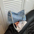 denim mini handbag with colorful embroidery design
