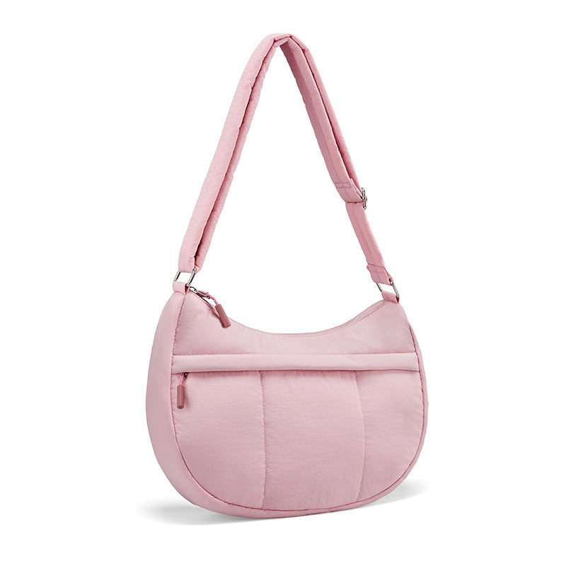 Fashionable shoulder bag with padded shoulder strap and multiple compartments