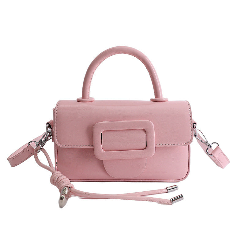 mini handbag with decorative snap closure