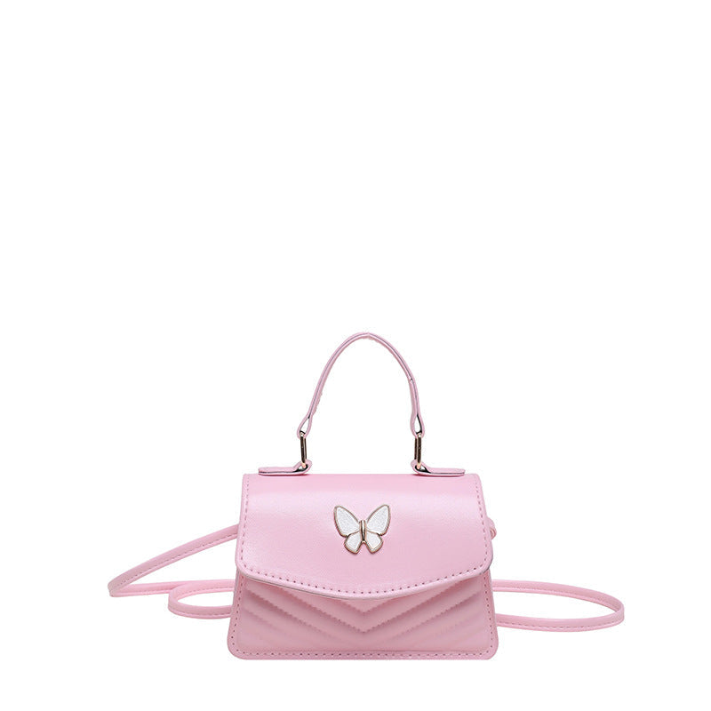 Chic Mini Handbag with Elegant Butterfly Accent