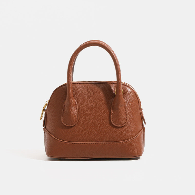 Ladies mini handbag with structured synthetic leather