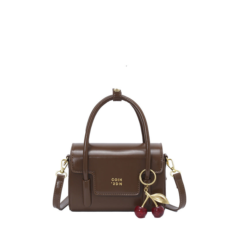 Ladies Mini-Handbag with Elegant Structure and Charming Pendant